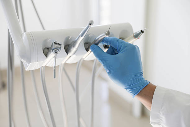 Professional Tooth Extraction technician working in Burlington, IA